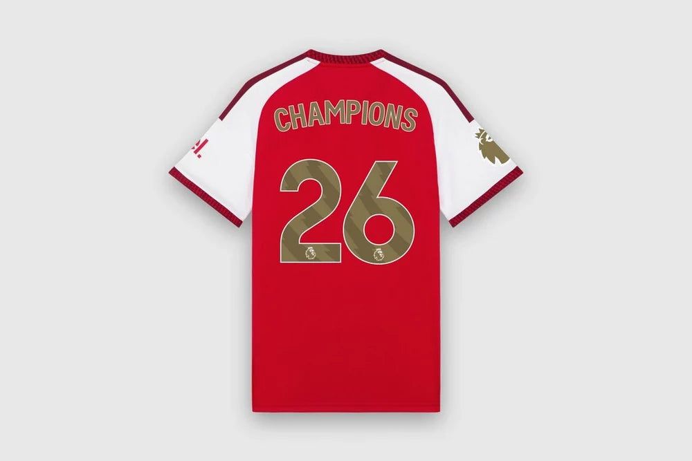 Arsenal home Champions edition tee 26/27