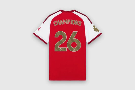 Arsenal home Champions edition tee 26/27