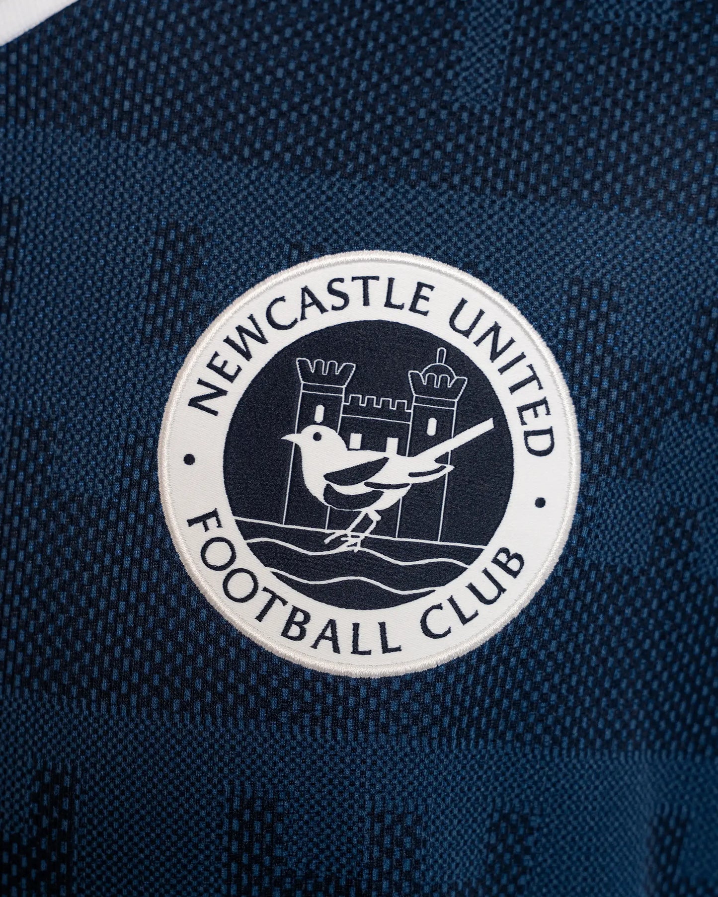 Newcastle away tee 26/27