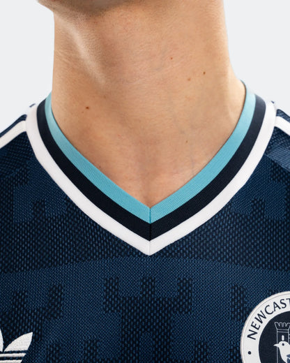 Newcastle away tee 26/27